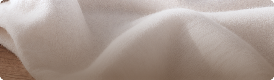 Soft white cotton fabric folds
