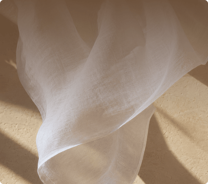 Light cotton cloth floating over warm fabric